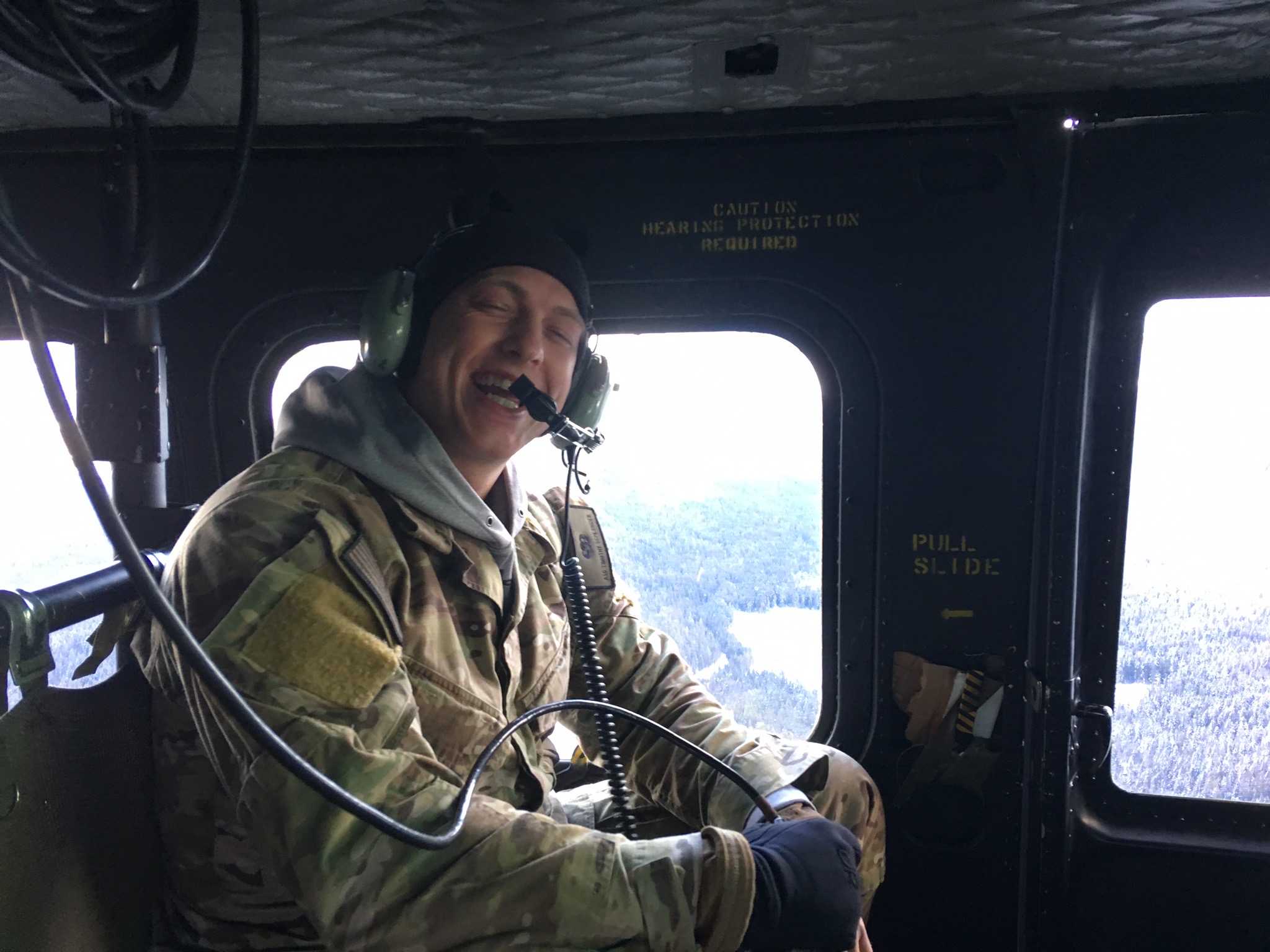 Timothy during his United States Air Force service aboard an aircraft